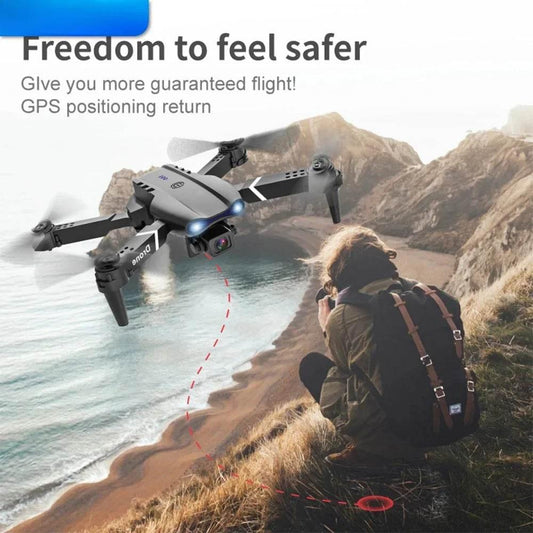 E99 Quadcopter Folding Drone Remote Control Handle Four Axis Aircraft HD Photography UAV Altitude Fixation - Empire P.E